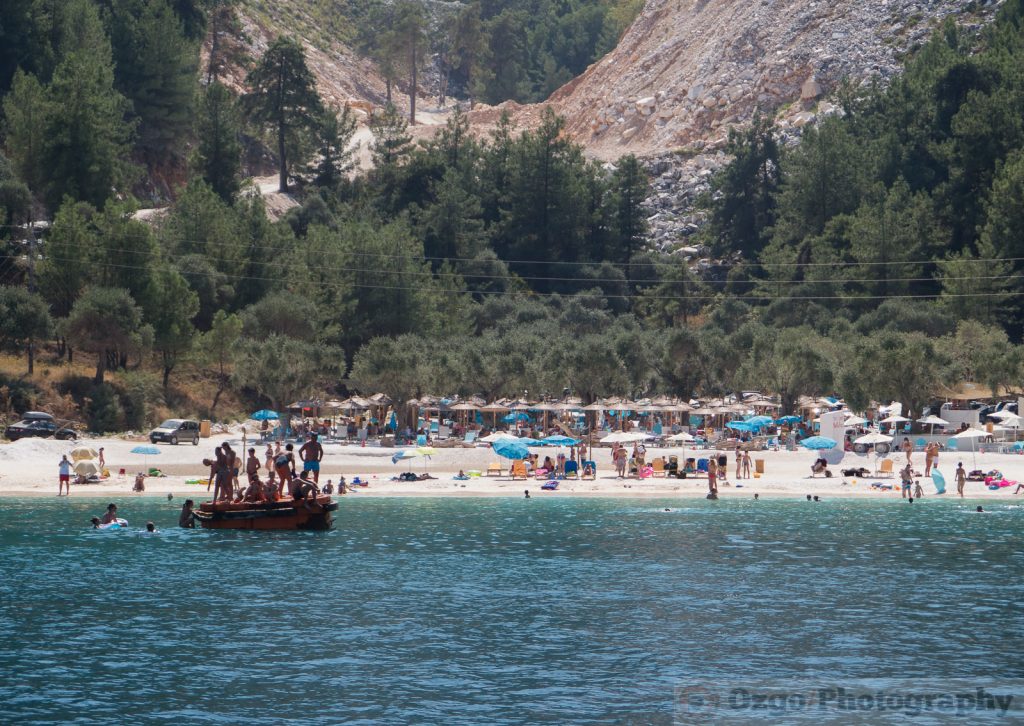 People on the beach in Porto Vathy, Marble Beach, Thassos